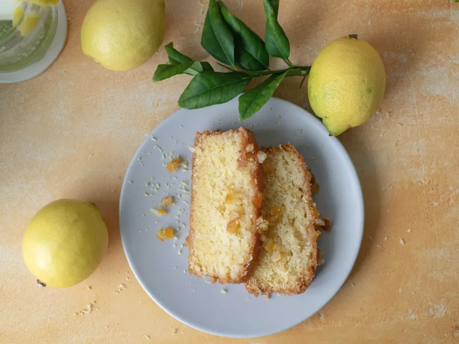 Two slices of lemon pound cake on a plate