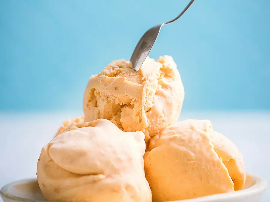 A bowl of scooped ice cream